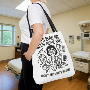 Funny nurse tote bag featuring a chaotic cartoon nurse surrounded by medical supplies and the text “This Bag Has Seen Some Sh*t (Don’t Ask What’s Inside)” — perfect for CNA, RN, ER, ICU, and nursing student use with strong nurse humor appeal.